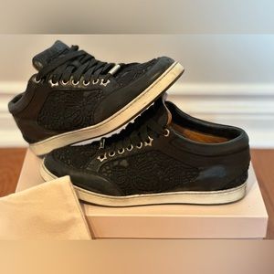 Women’s Jimmy Choo leather and lace sneaker, size 8.